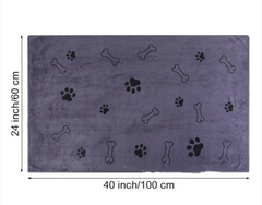 Gray towel with bone and paw print patterns and measurements on a white background