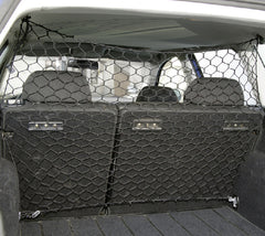Car trunk with a black cargo net dividing the seats